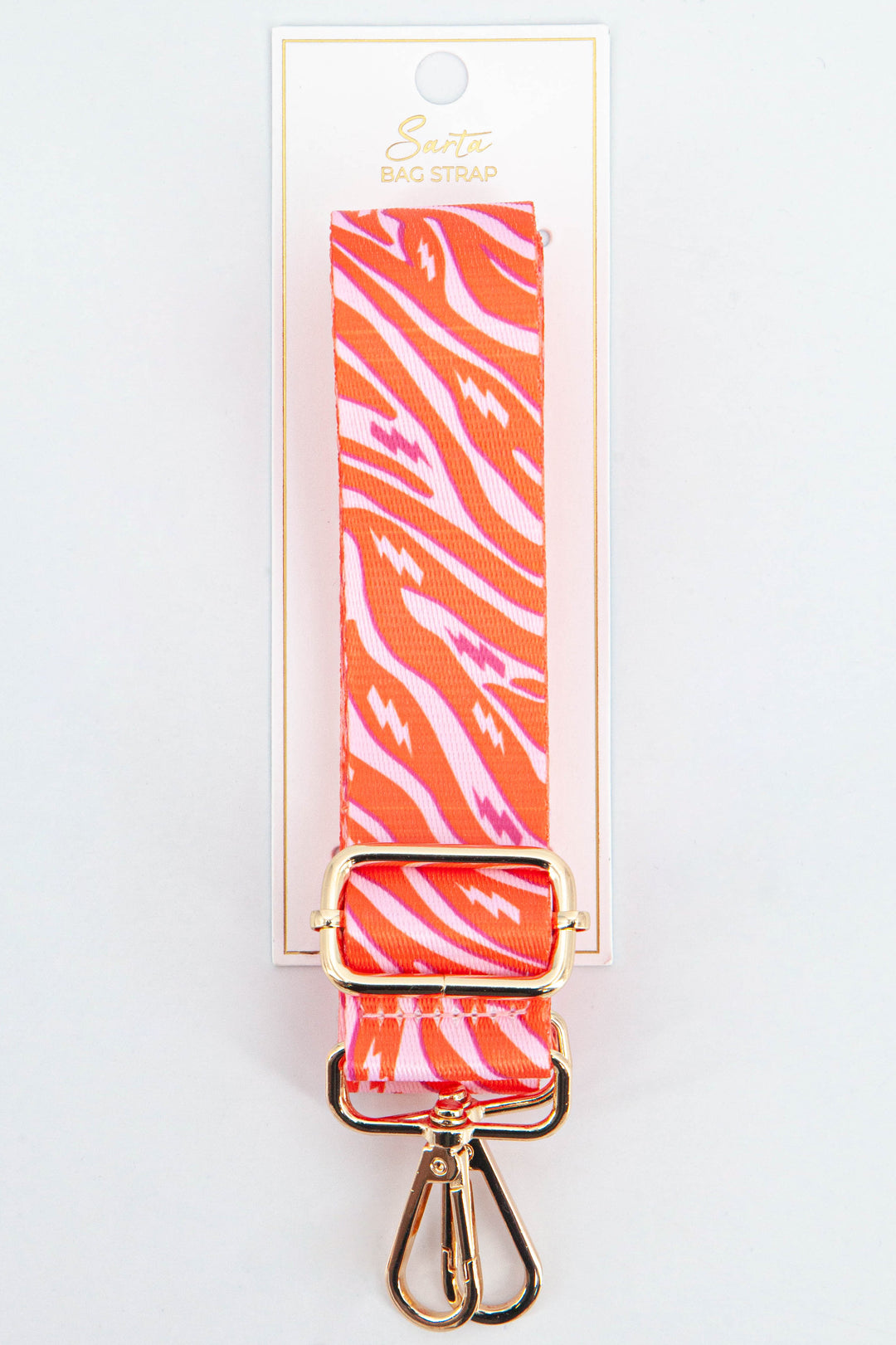 orange and pink zebra and lightning bolt pattern bag strap with gold hardware