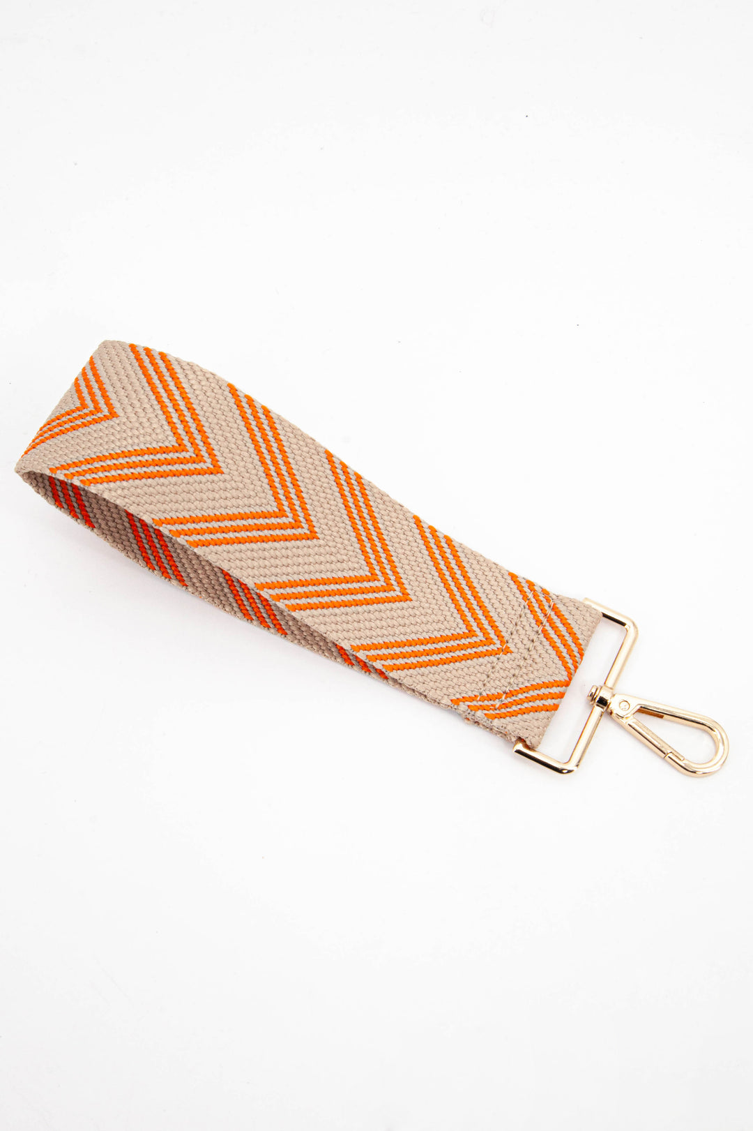 beige and orange chevron striped woven clip on wrist strap with gold hardware