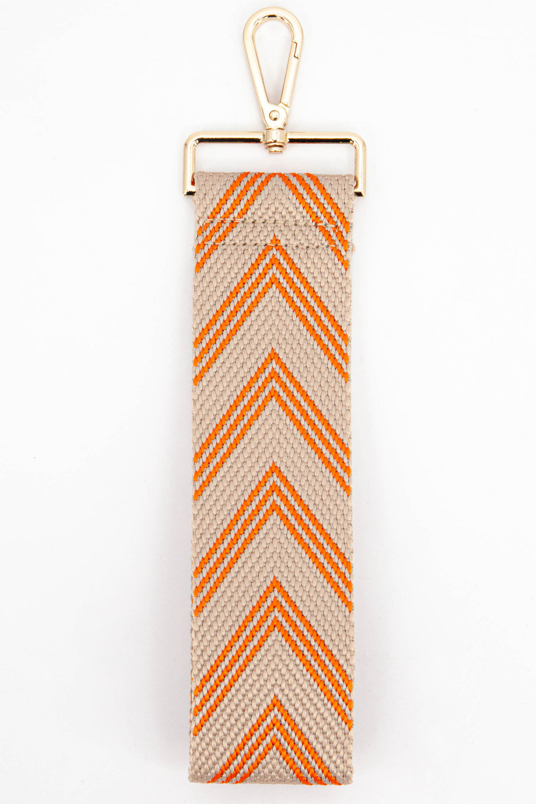 orange chevron pattern clutch bag wrist strap with gold snap hook attachment