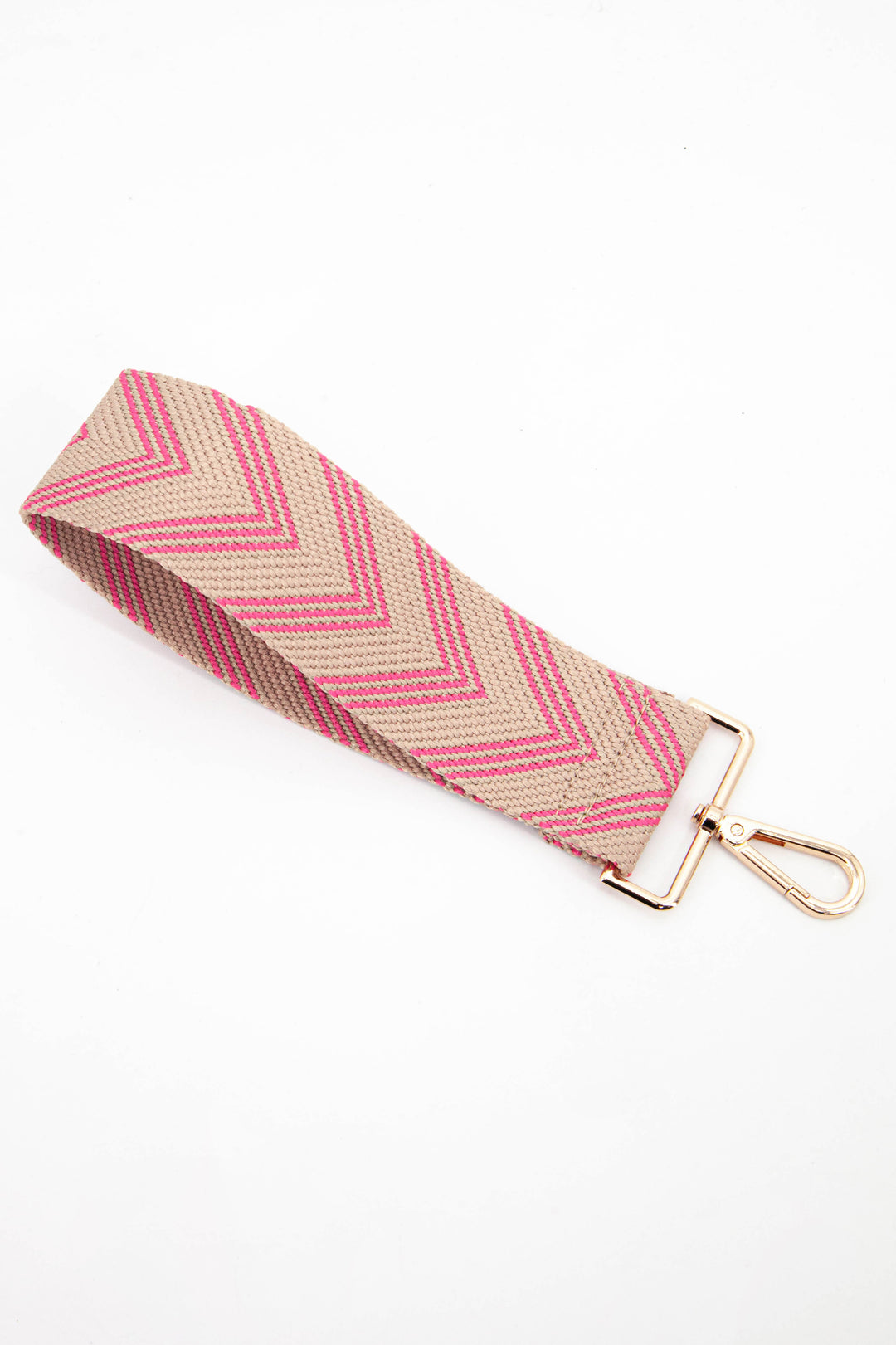 beige and pink chevron striped woven clip on wrist strap with gold hardware