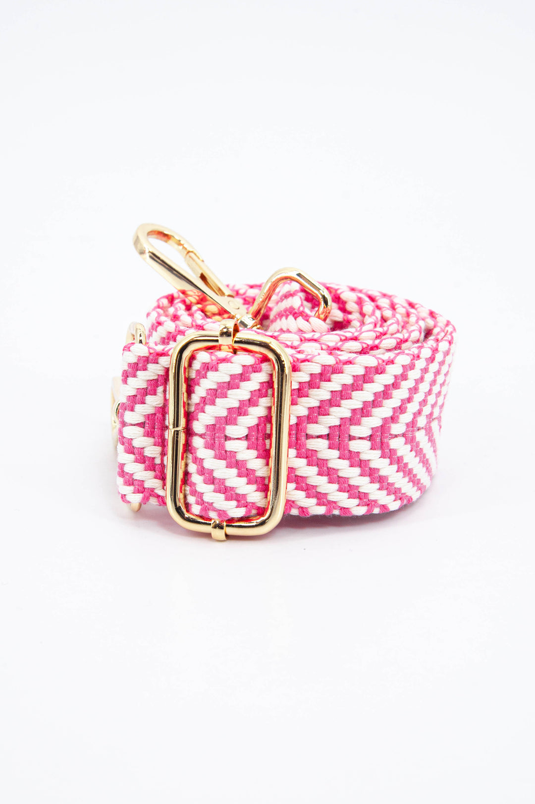 close up of the woven fabric and gold adjustable buckle