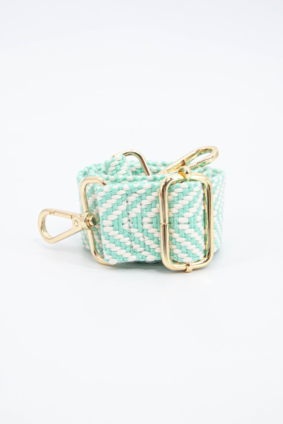 close up of the mint green chevron pattern and gold adjustment buckle