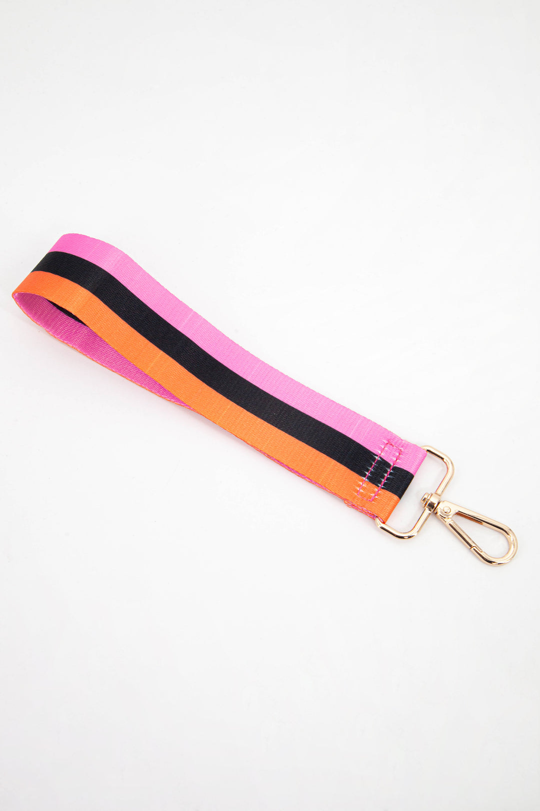 orange, black and pink striped wrist strap with gold snap hook attachment