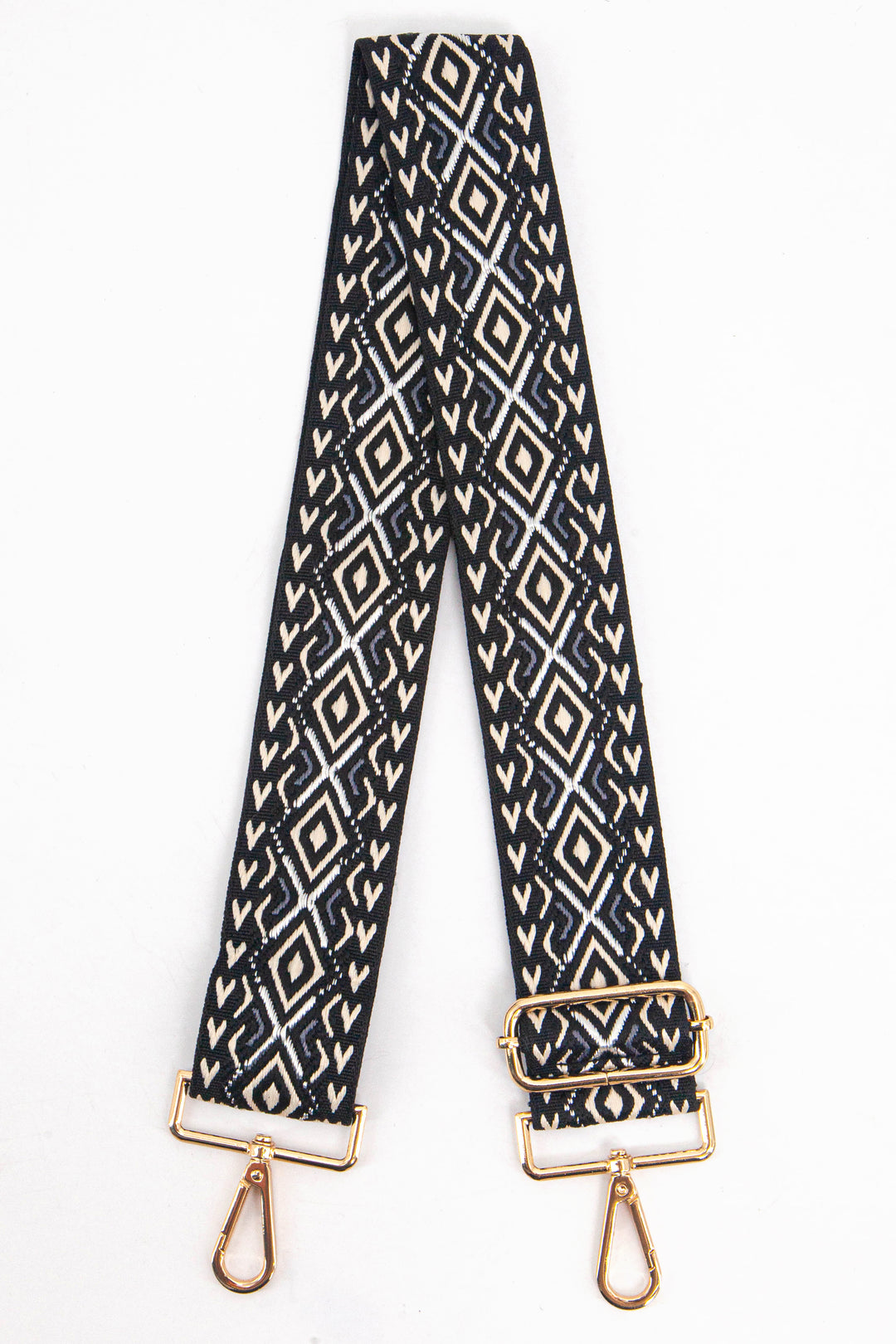 black and gold ornate geometric pattern bag strap with gold clip on hardware