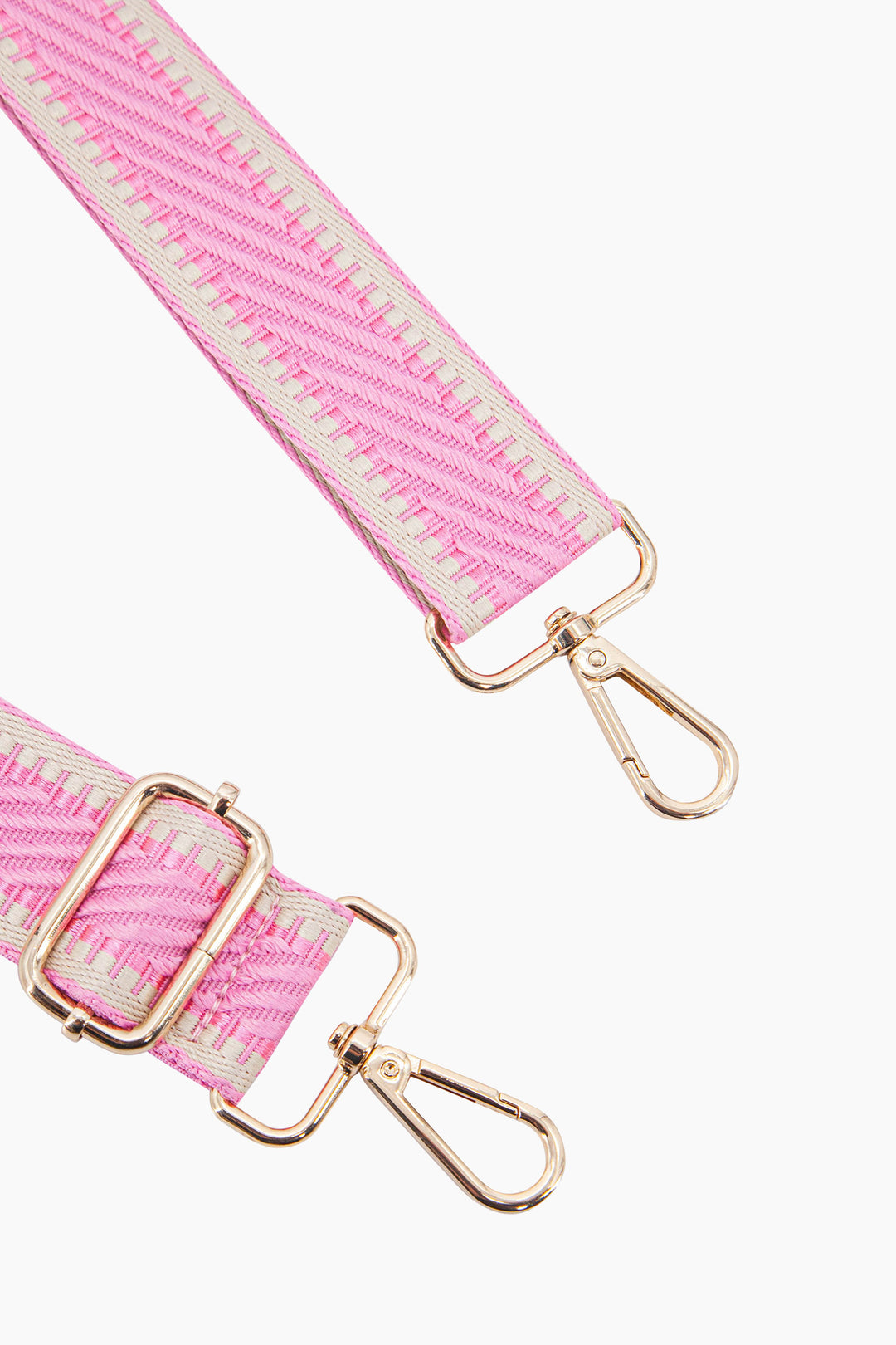 emerson-woven-bag-strap-pink-striped-trim-close-up-gold-snap-hoop-attachments
