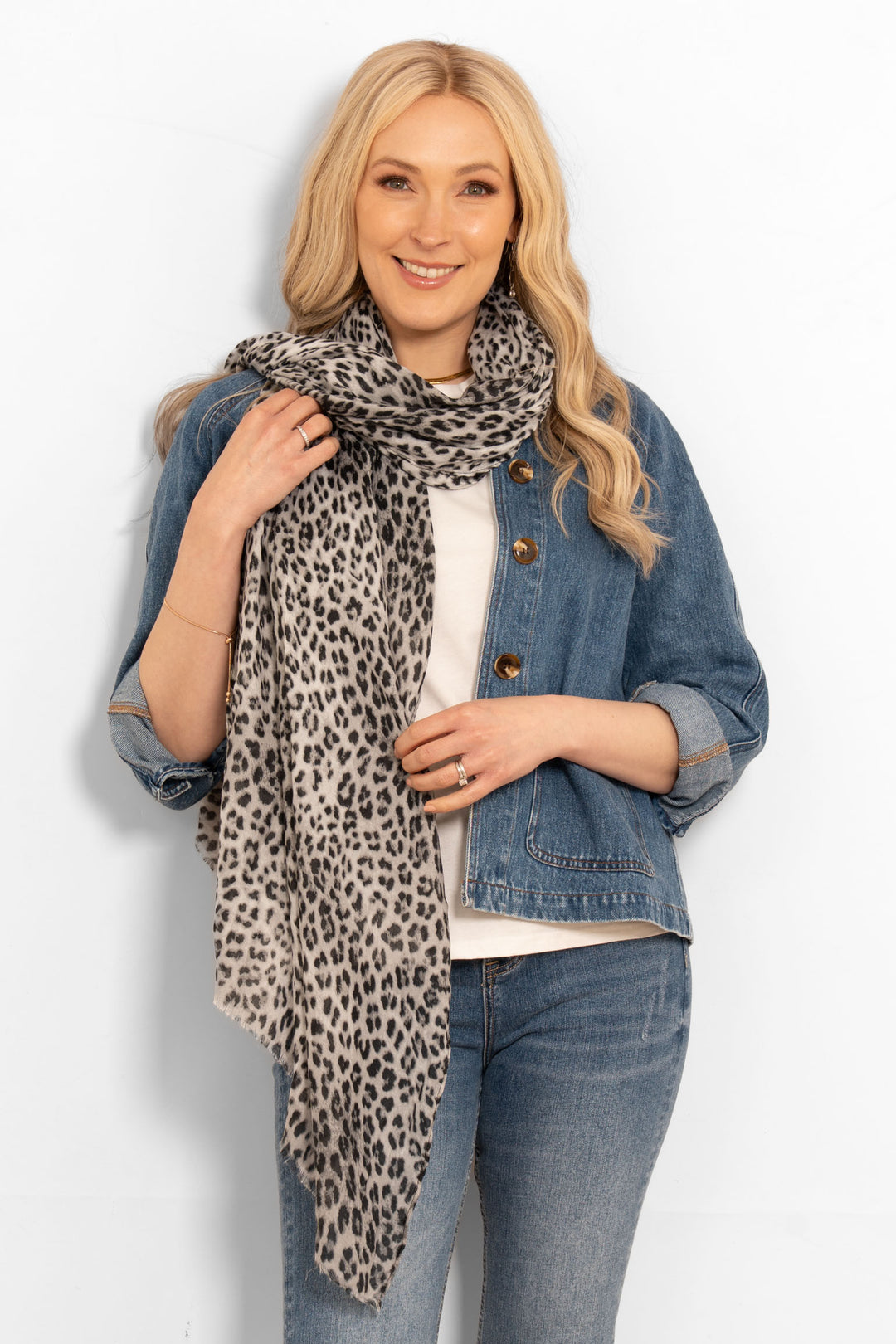 odessa-lightweight-scarf-white-leopard-print-model-wrapped-around-neck-shoulder