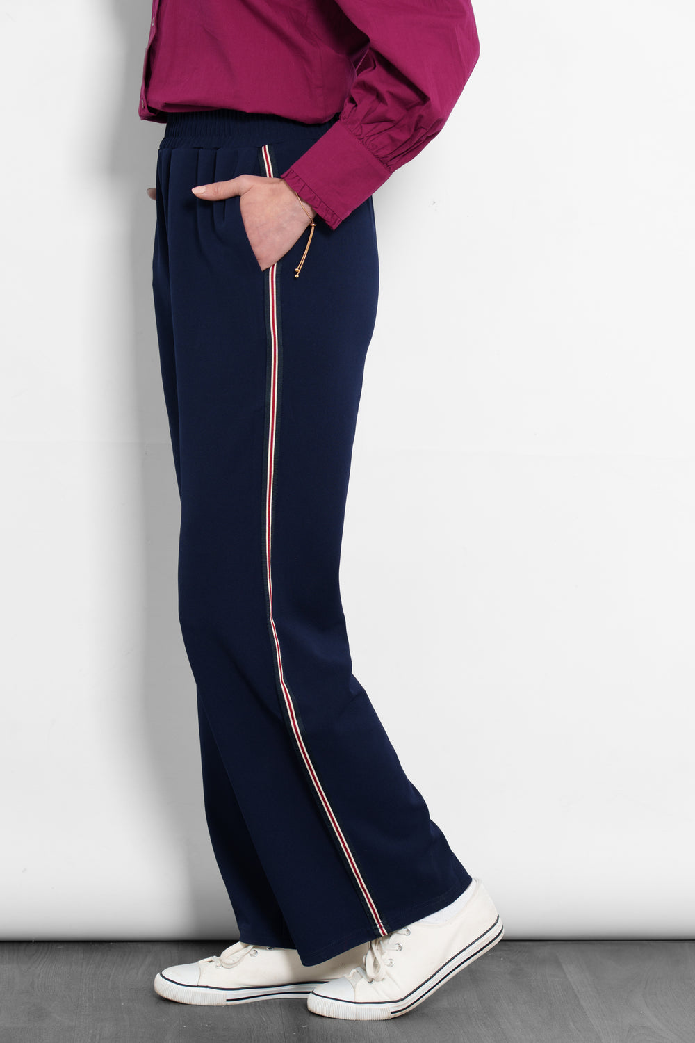 margot-wide-leg-trousers-navy-blue-red-stripe-model-side-view