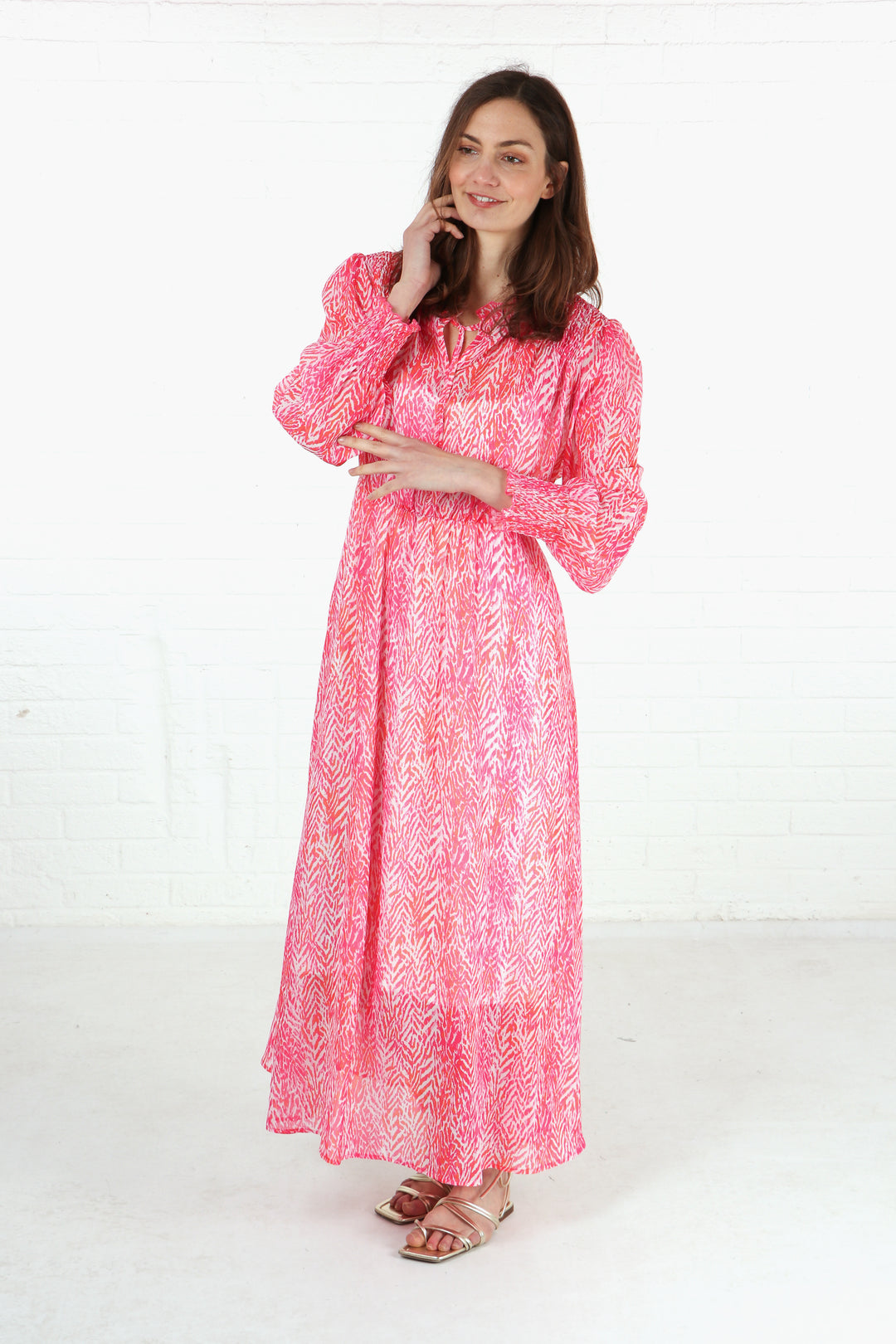 long sleeve chiffon midi dress with shirred shoulders and long sleeves