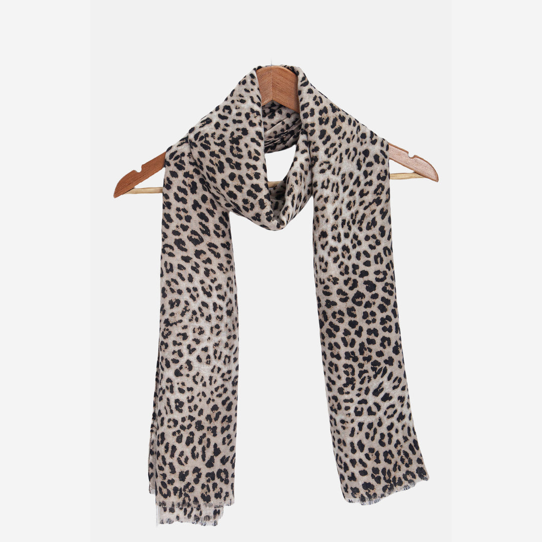 miley-white-leopard-lightweight-scarf-draped-on-coat-hanger