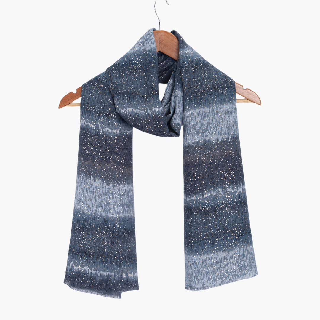 tierney-grey-ombre-stripe-lightweight-scarf-draped-on-coat-hanger