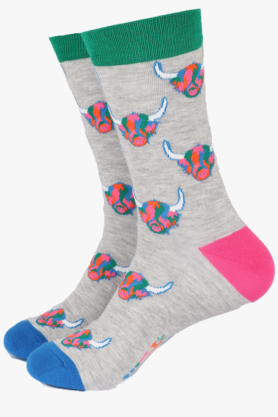 grey socks with a rainbow highland cow pattern