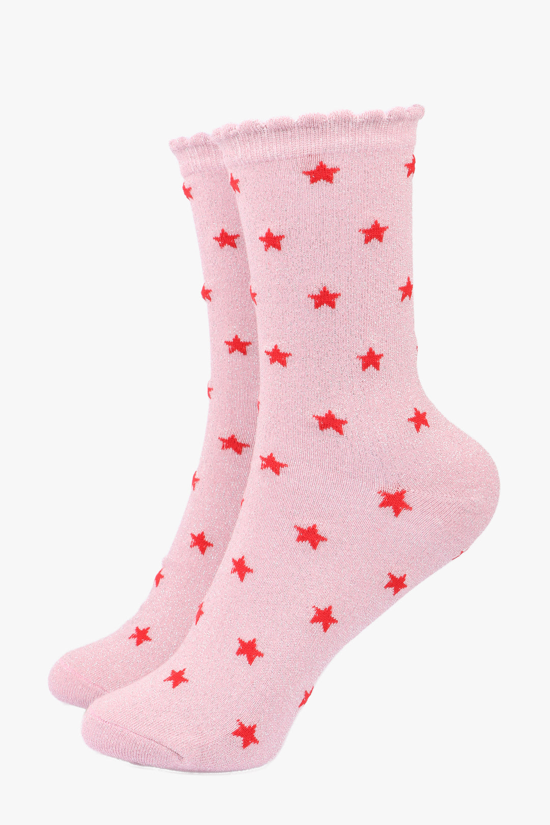 pink socks with a scalloped cuff and an all over red star pattern and sparkly silver glitter shimmer