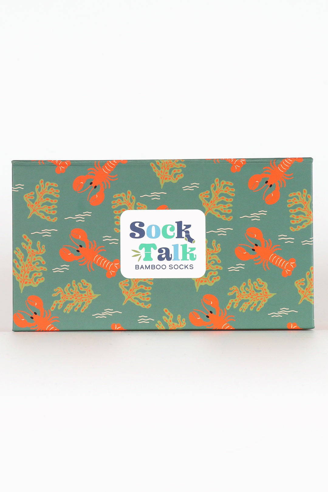 close up of the lobster print gift box, the box is green with an all over pattern of red lobsters and sea weed