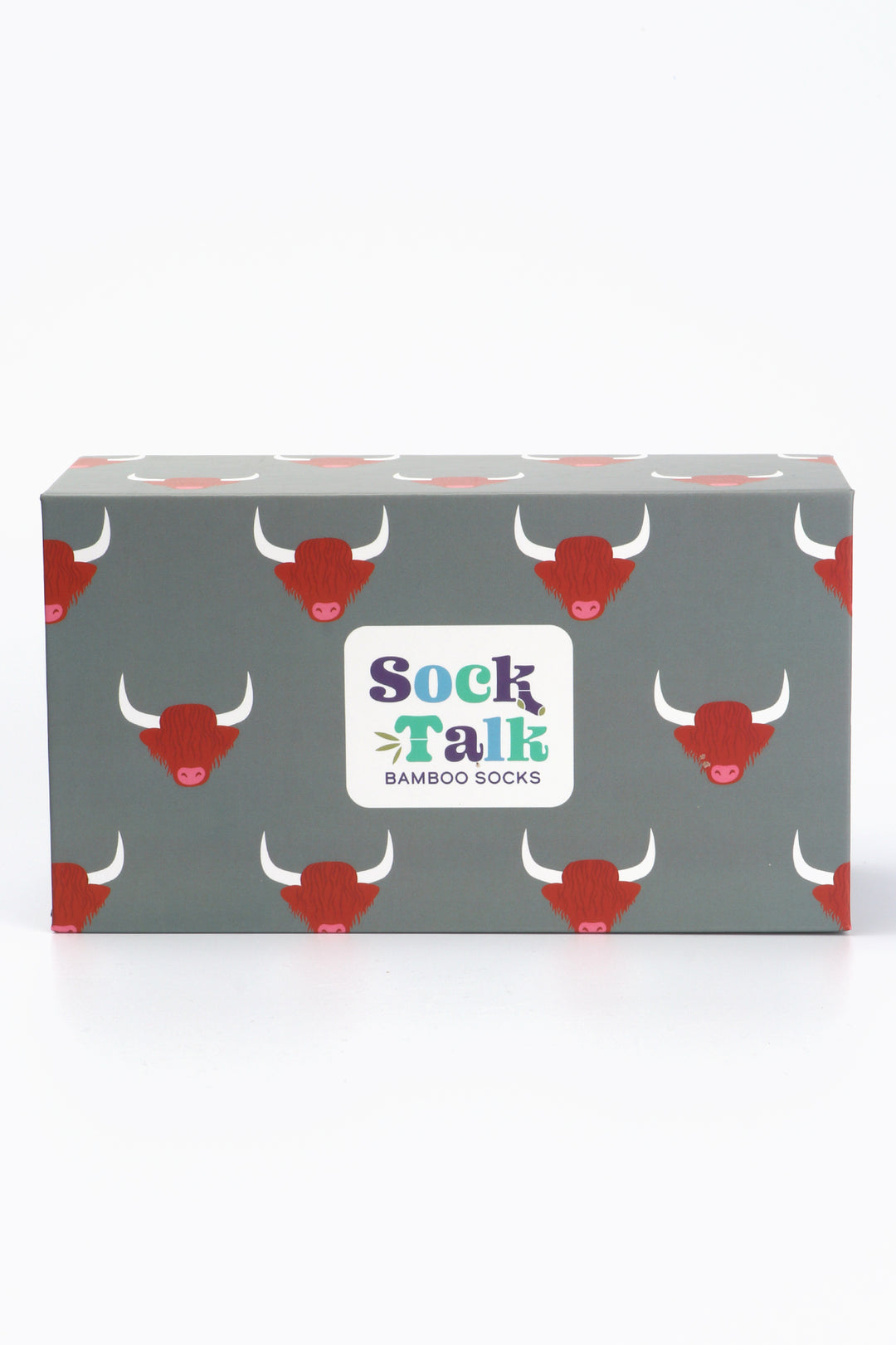 grey sock gift box with an all over highland cow pattern on it