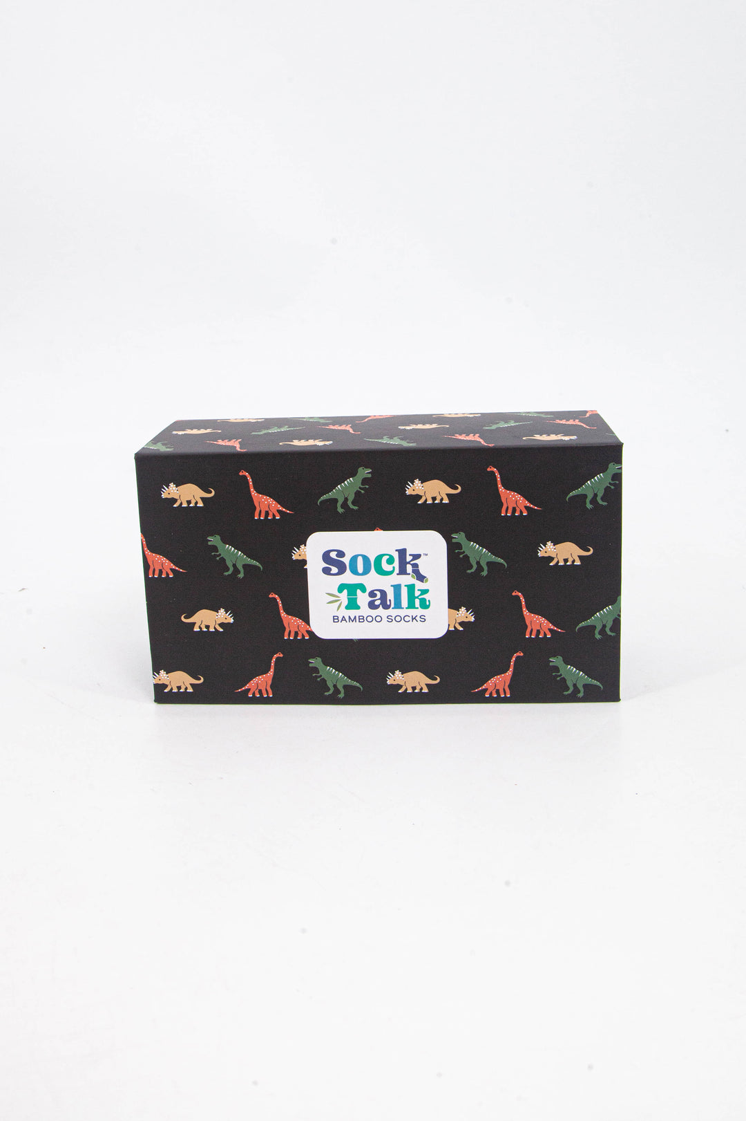 black sock box with a pattern of green, yellow and orange dinosaurs all over