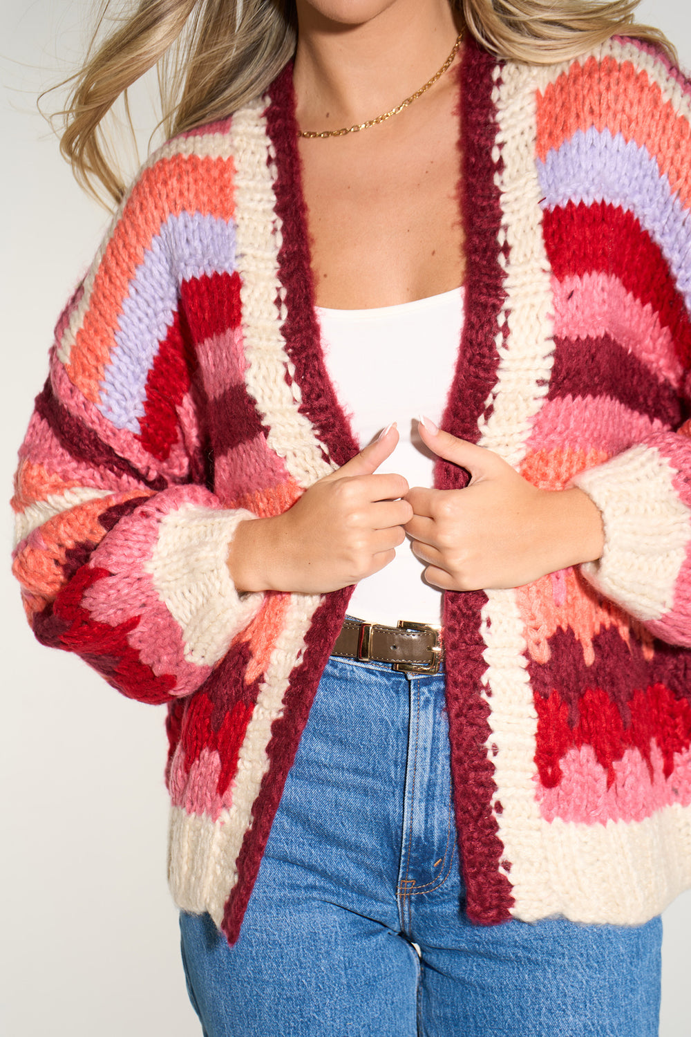 hand-knitted-strip-cardigan-in-red-berry-closeup