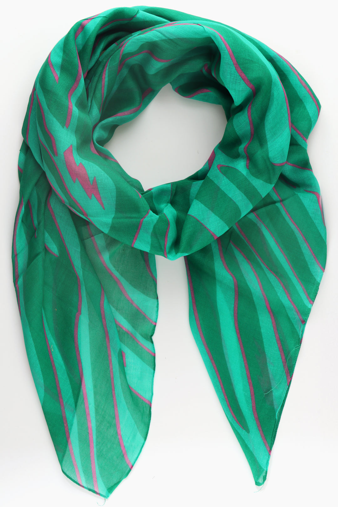 green zebra print cotton scarf with large pink lightning bolt details throughout the design