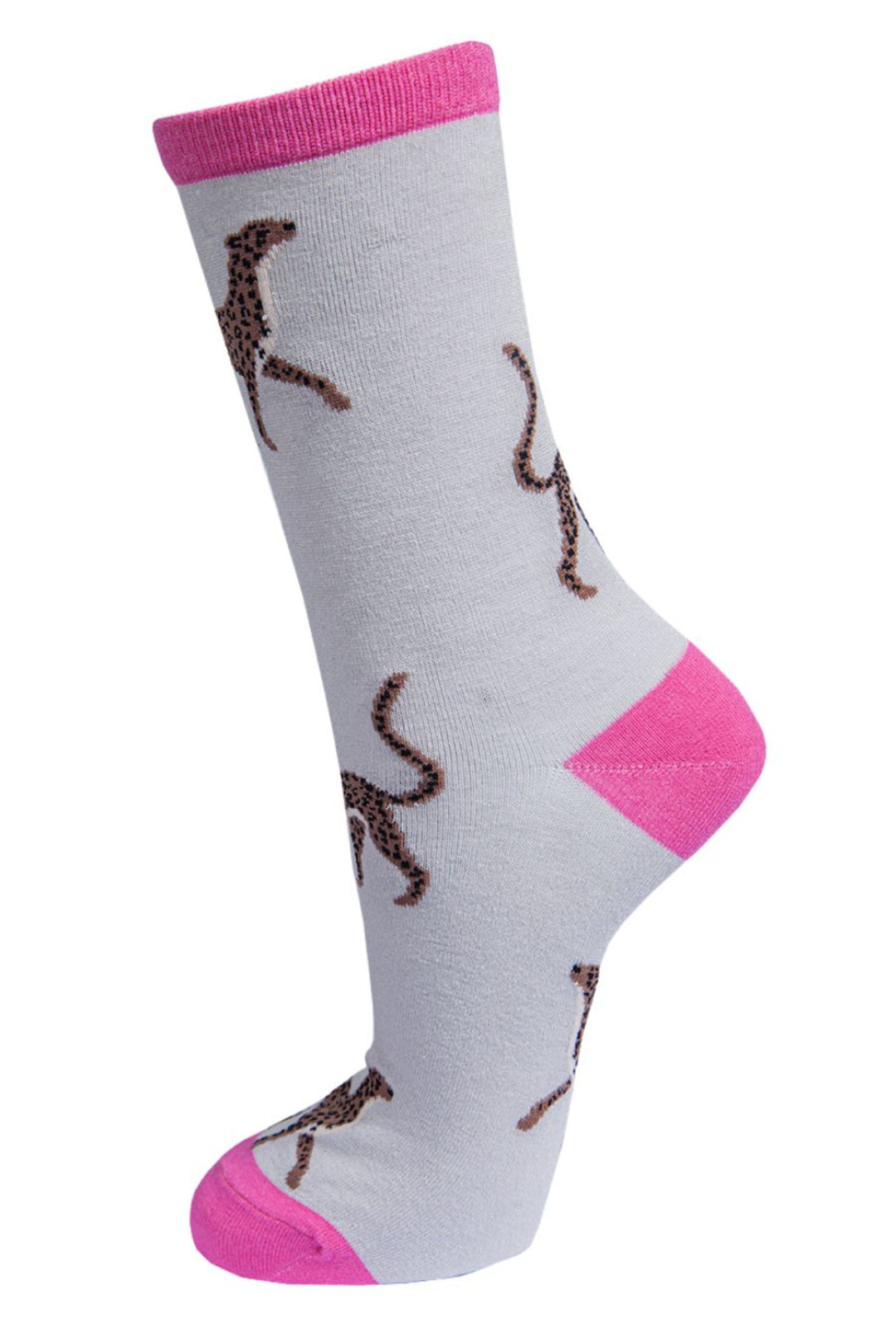 grey socks with pink heel, toe and cuff with a pattern of cheetah cats