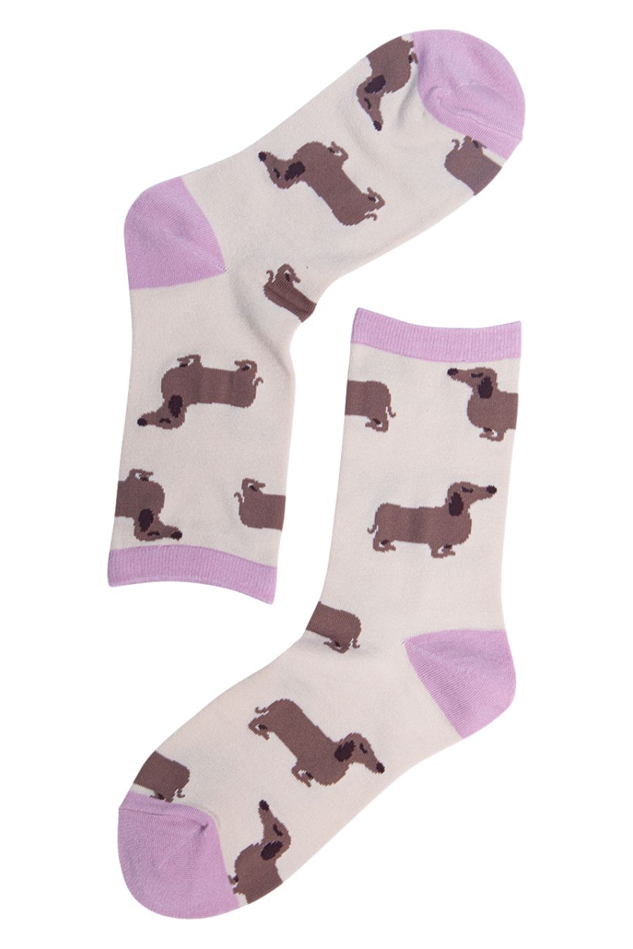 close up of the sausage dog pattern on the cream and pink ankle socks