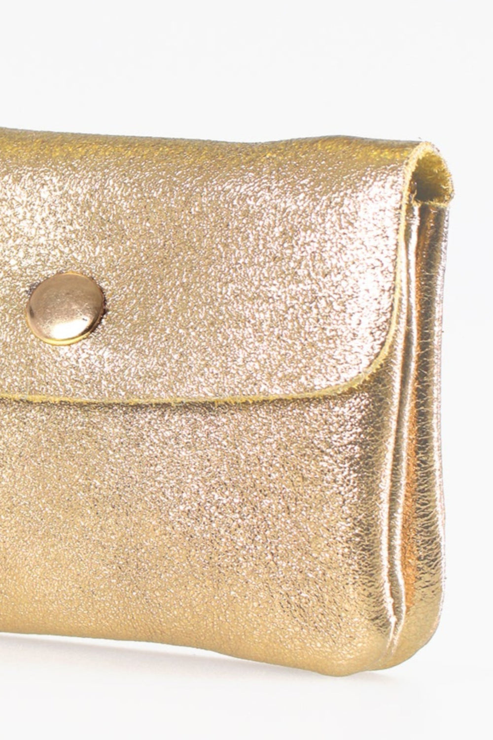 close up of the metallic gold leather, the small coin purse has a shiny appearance