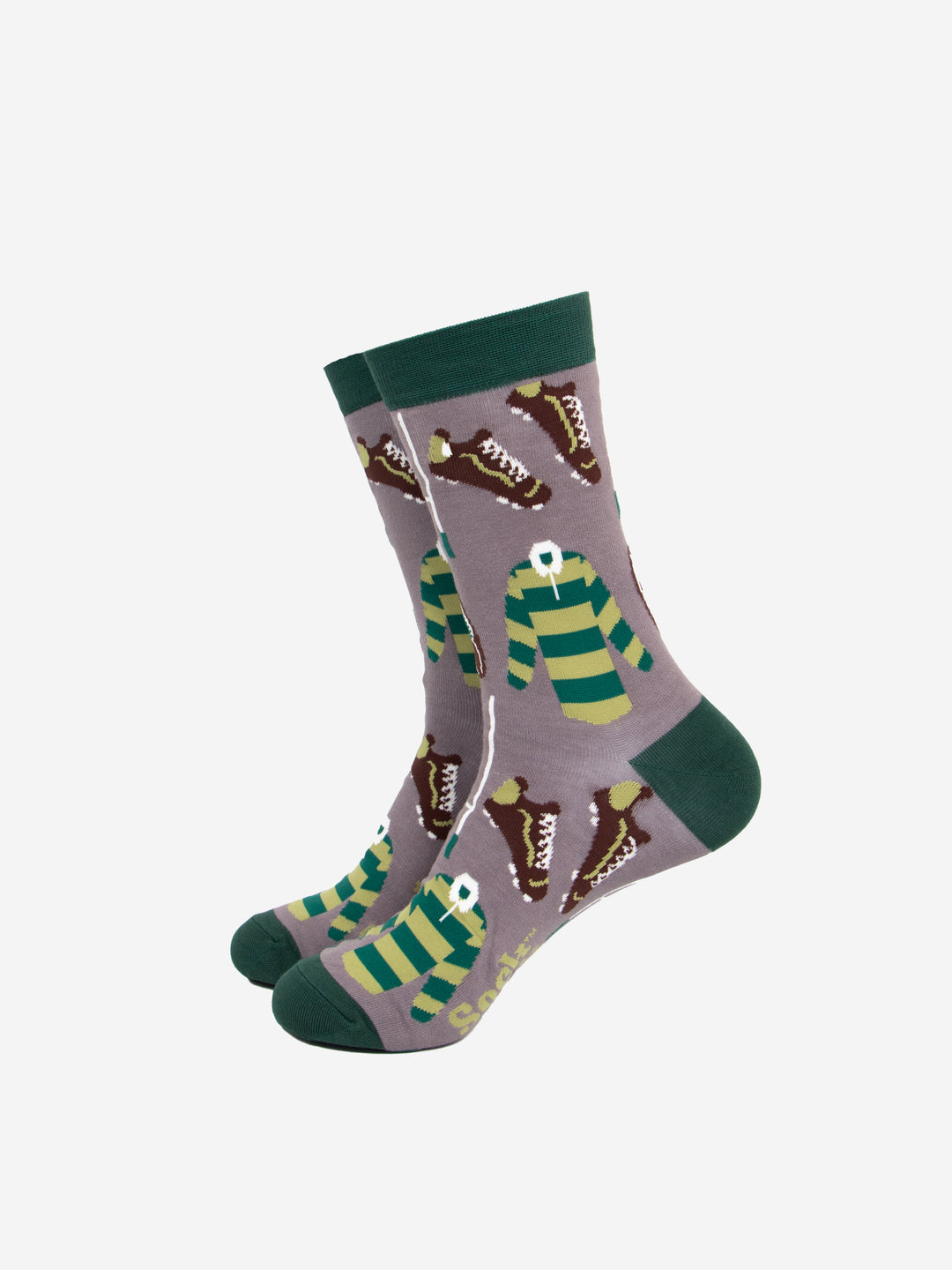 grey bamboo socks with green heel, toe and cuff, there is a pattern of green striped rugby shirts, brown rugby boots and white goals all over the design