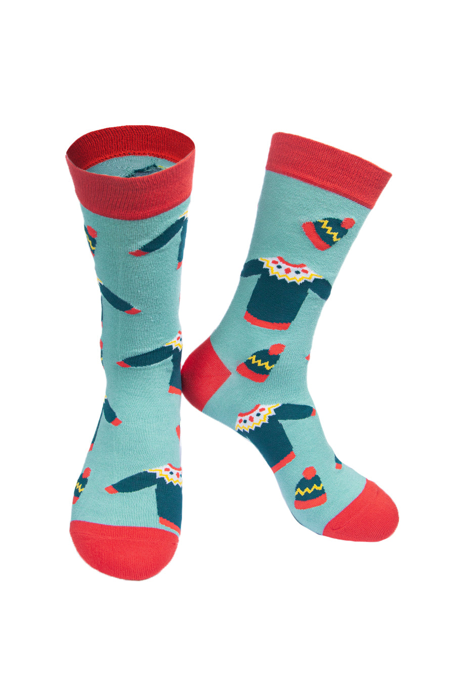 green socks with red heel, toe and cuff with a pattern of christmas jumpers and knitted hats