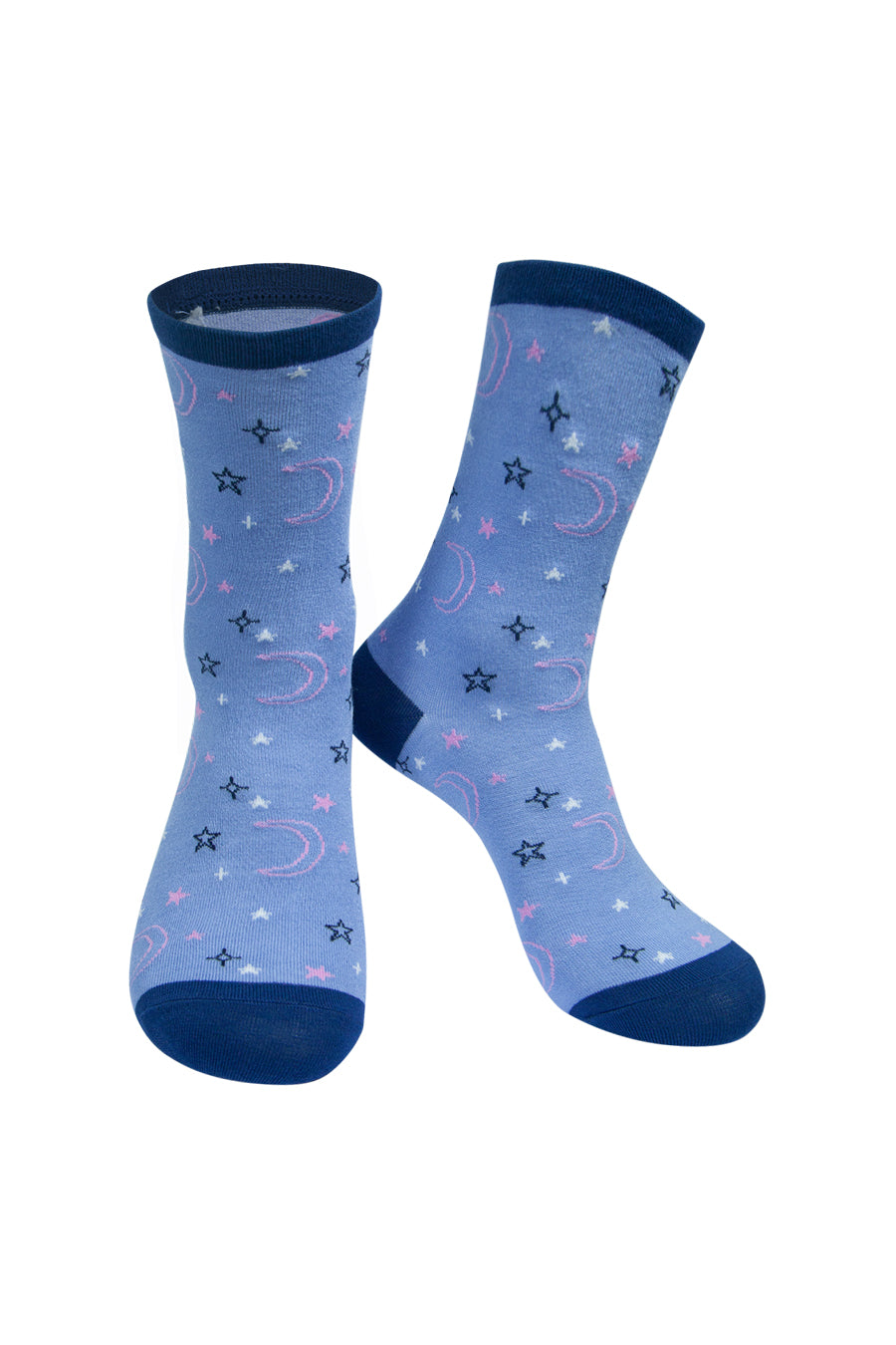 light blue socks with a navy blue heel, toe and cuff with an all over pattern of stars and moons