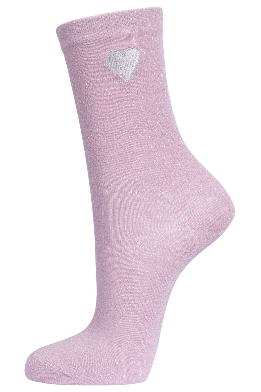 light pink ankle socks with a silver embroirderd heart on the ankle, the socks have an all over glitter sparkle