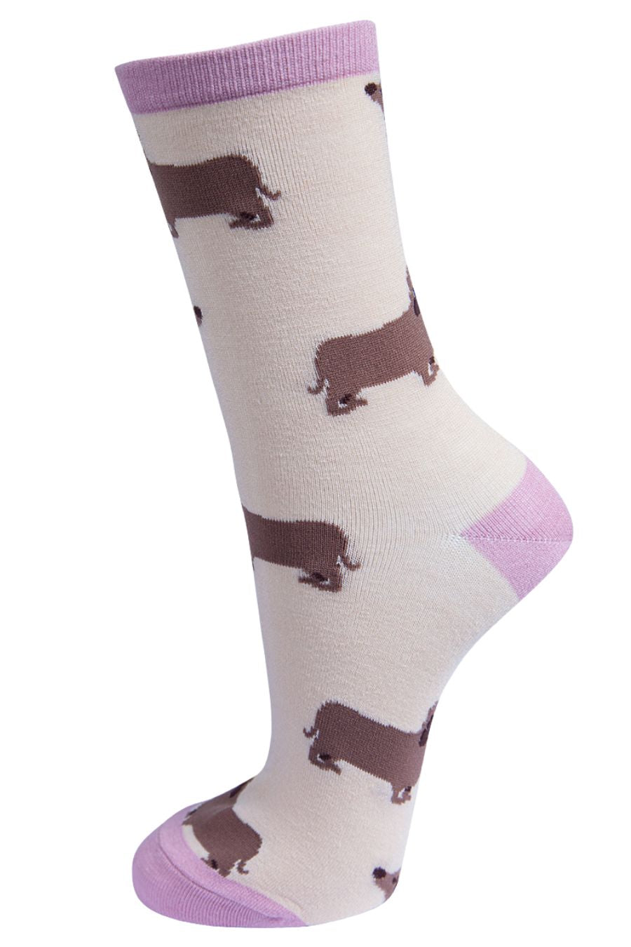 cream socks with light pink heel, toe and cuff with a pattern of beige sausage dogs all over