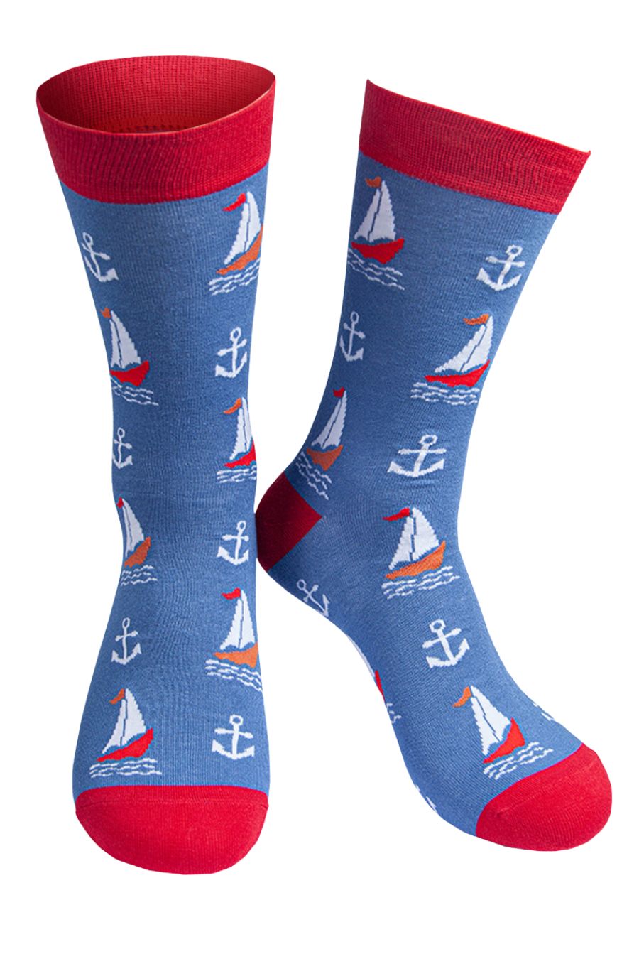 blue socks with a red heel, toe and cuff with a pattern of sailing boats and anchors