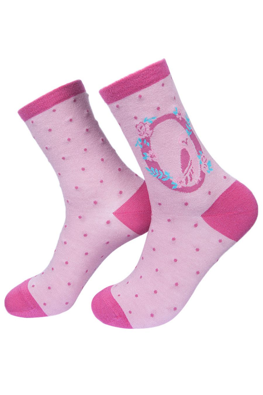 pink socks with a large letter o, an owl and a floral pattern on the ankle