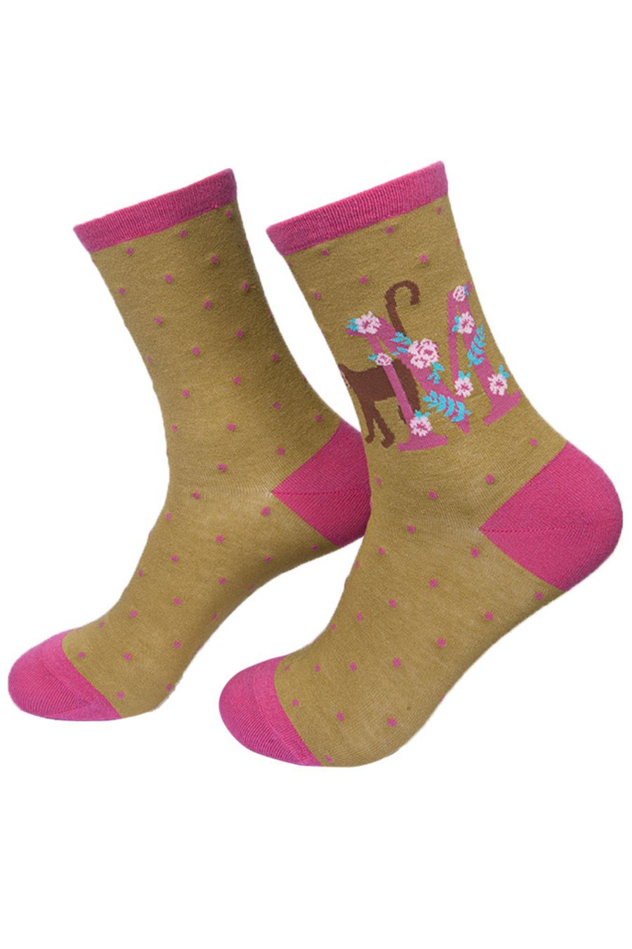 mustard yellow socks with a large letter m, a mokey and a floral pattern on the ankle