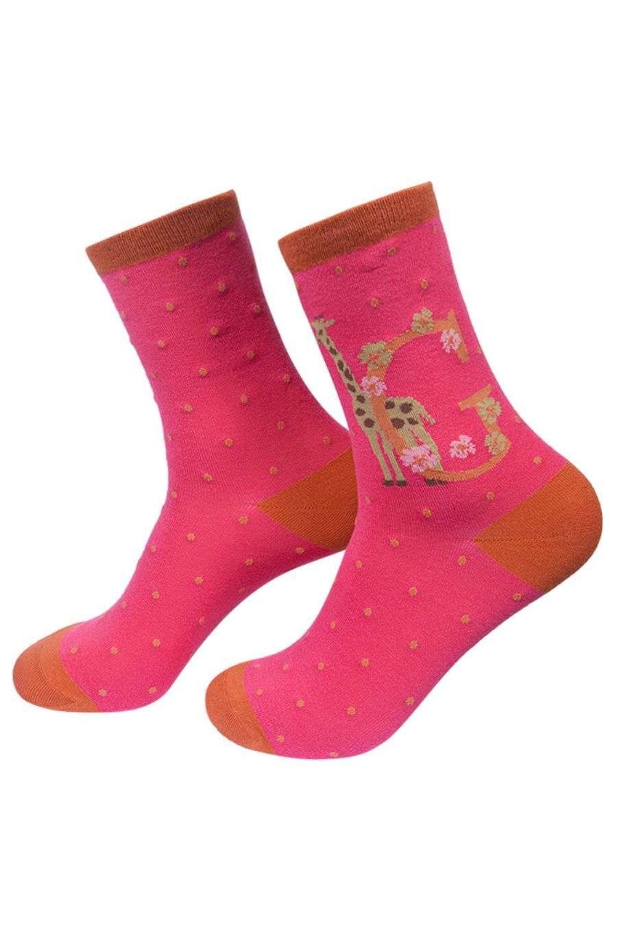 hot pink socks with a large letter g, a giraffe and a floral pattern on the ankle