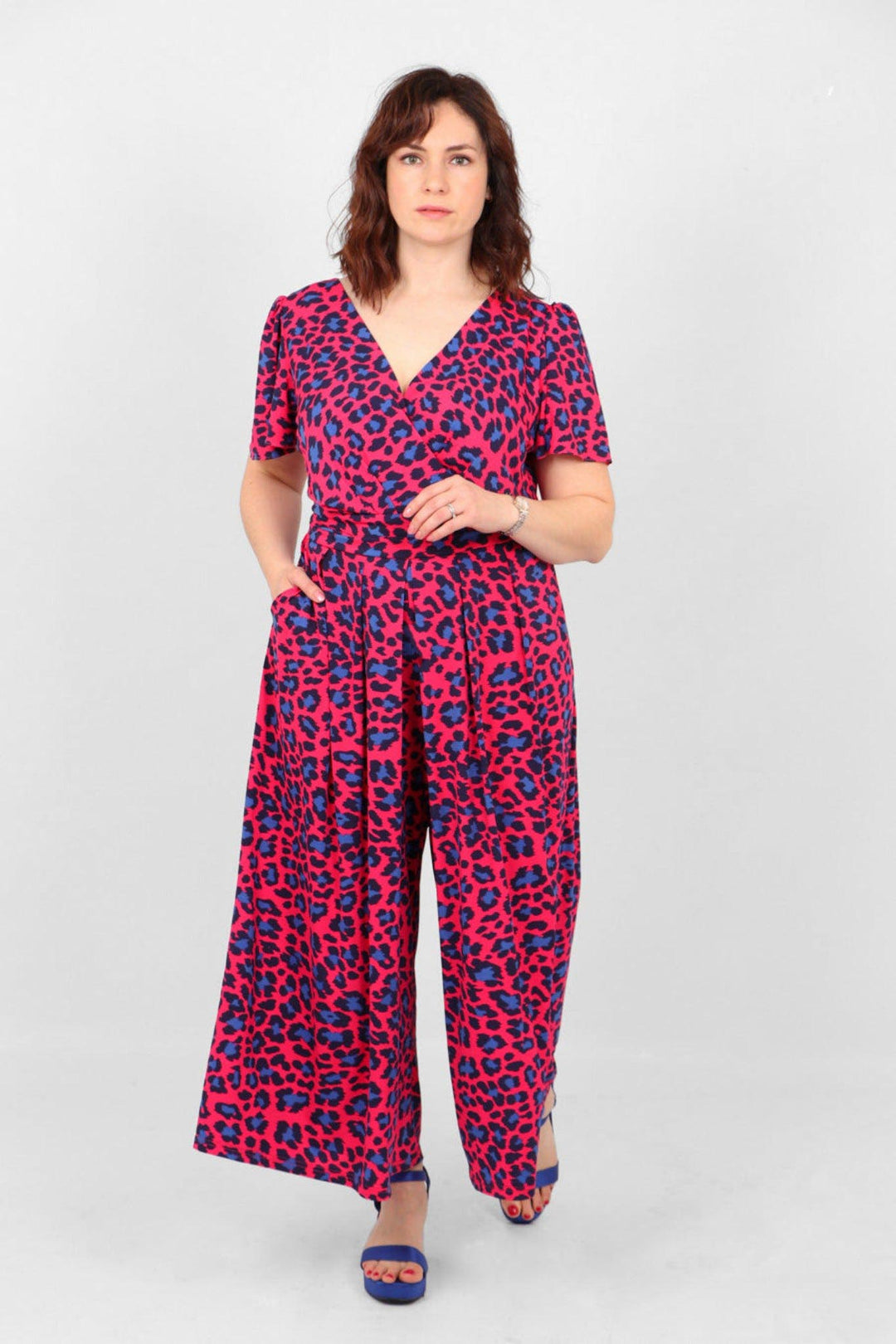 Model showing fuchsia and navy blue leopard print jumpsuit - with pockets